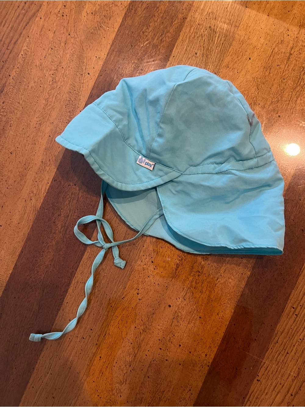 I play Blue Baby Sun Hat with Chin Tie
